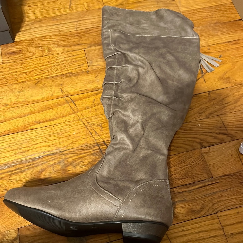 Brand new in box size 7.5 fergalicious wide calf boot